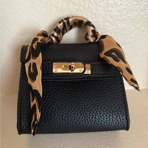 NWT Elegant Black Faux pebbled leather mini Handbag with Gold Accents